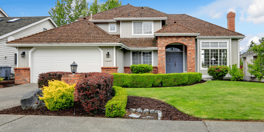 Exterior shot of home with great curb appeal taken from the street